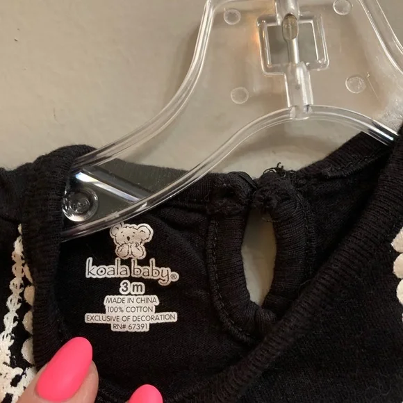 Baby onesie with a printed necklace